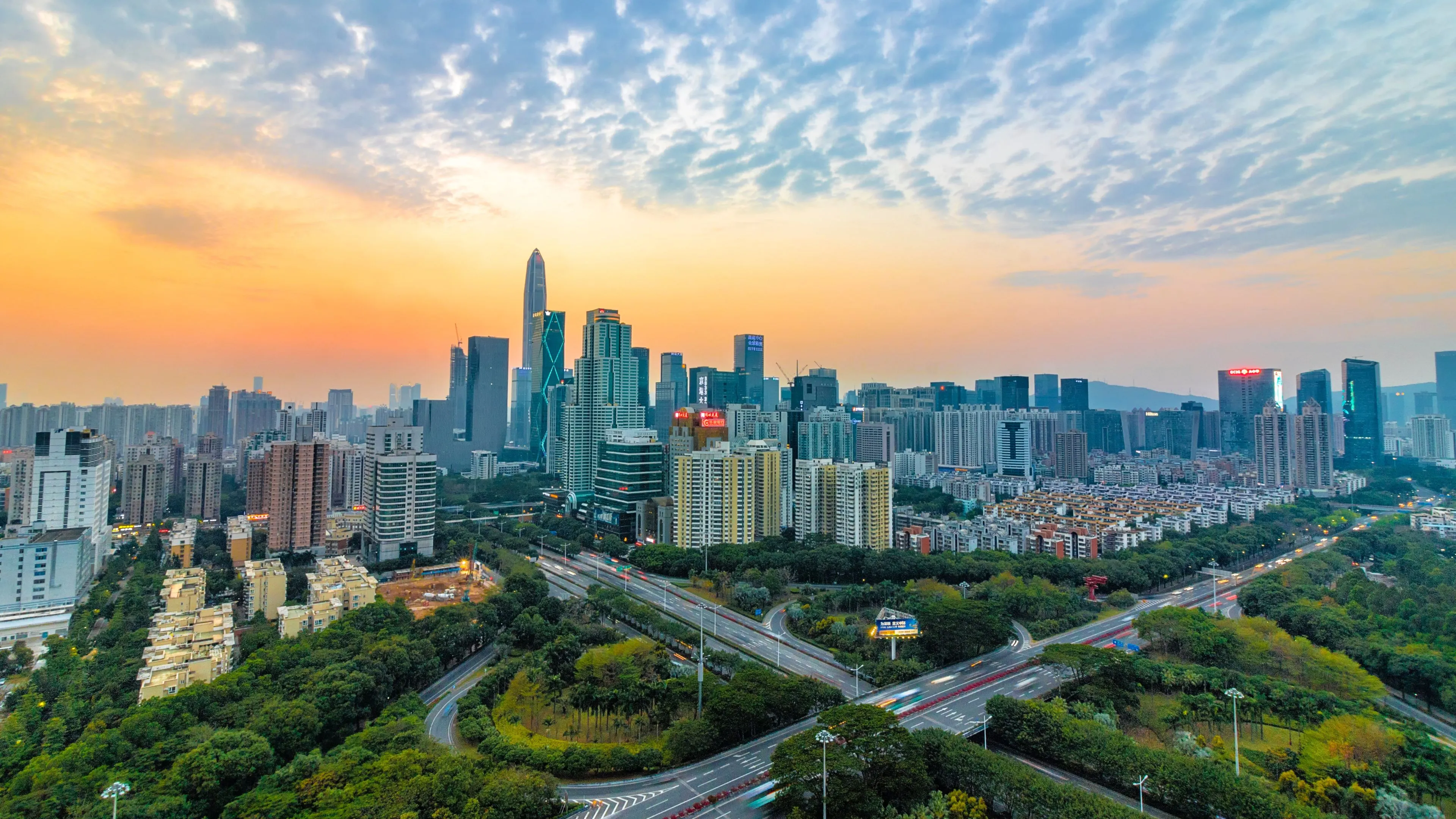 A global city skyline at sunset representing worldwide markets